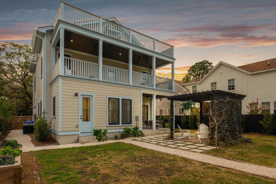 Exterior details and patio area of a home in , Charleston (Image 40).