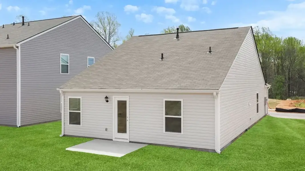 Exterior details and patio area of a home in Village Grove, Greenville (Image 4).