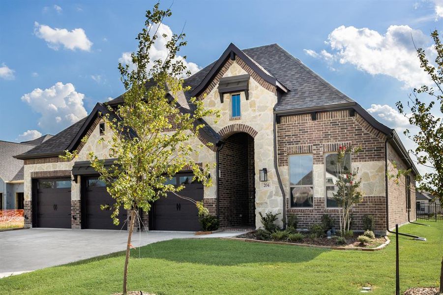 Front exterior of a new home in Heath Golf and Yacht, Heath, TX, highlighting curb appeal (Image 23).