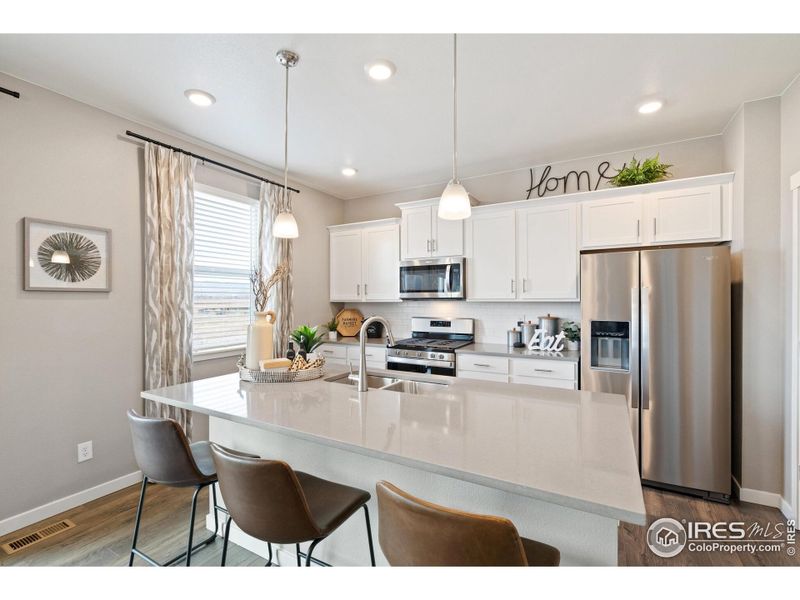 Furnished interior view inside a new home in Vista Meadows, Fort Lupton (Image 6).