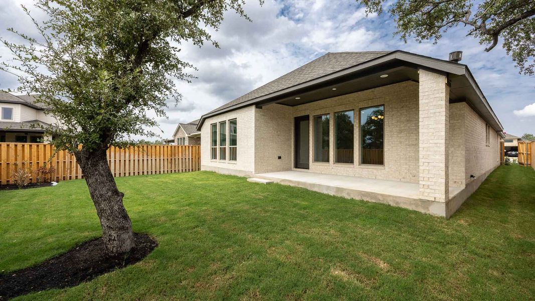 Exterior details and patio area of a home in Parmer Ranch, Georgetown (Image 3).
