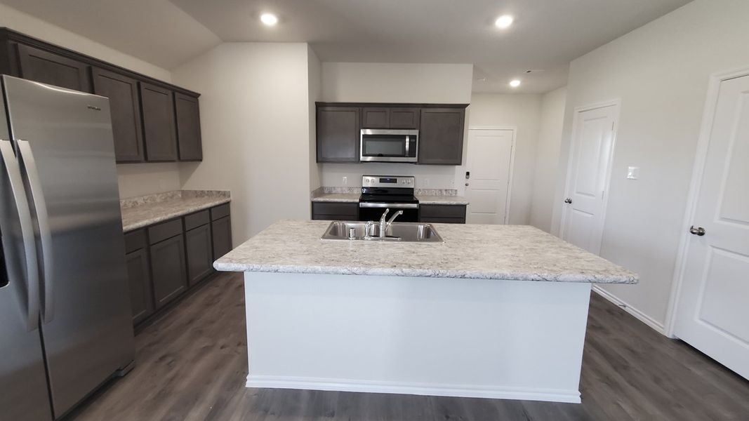 Representative furnished interior of a home built from the X40S Seabrook by D.R. Horton in Valor Farms, Royse City (Image 4).
