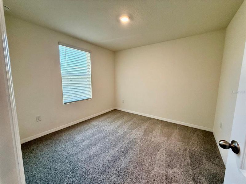 Spacious, unfurnished interior of a new home in Kindred, Kissimmee (Image 27).