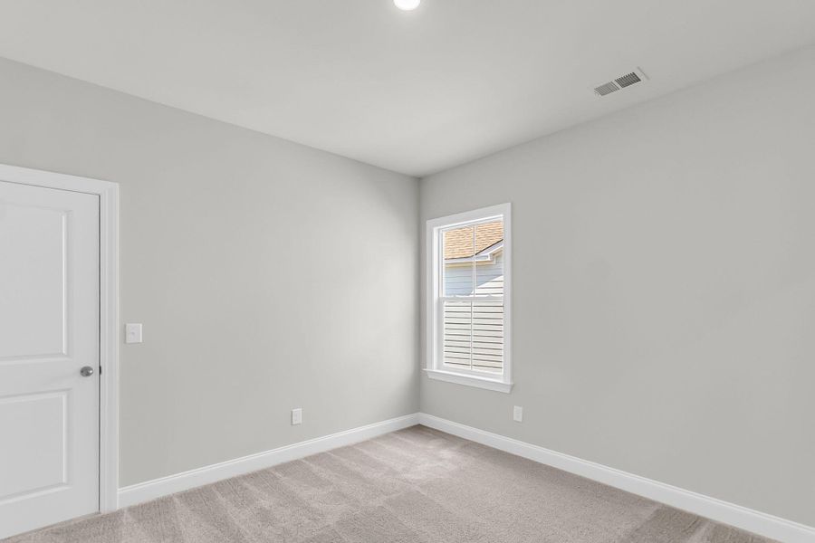 Spacious, unfurnished interior of a new home in Tidewater at Lakes of Cane Bay, Summerville (Image 41). Spacious, unfurnished interior of a new home in Tidewater at Lakes of Cane Bay, Summerville (Image 41).