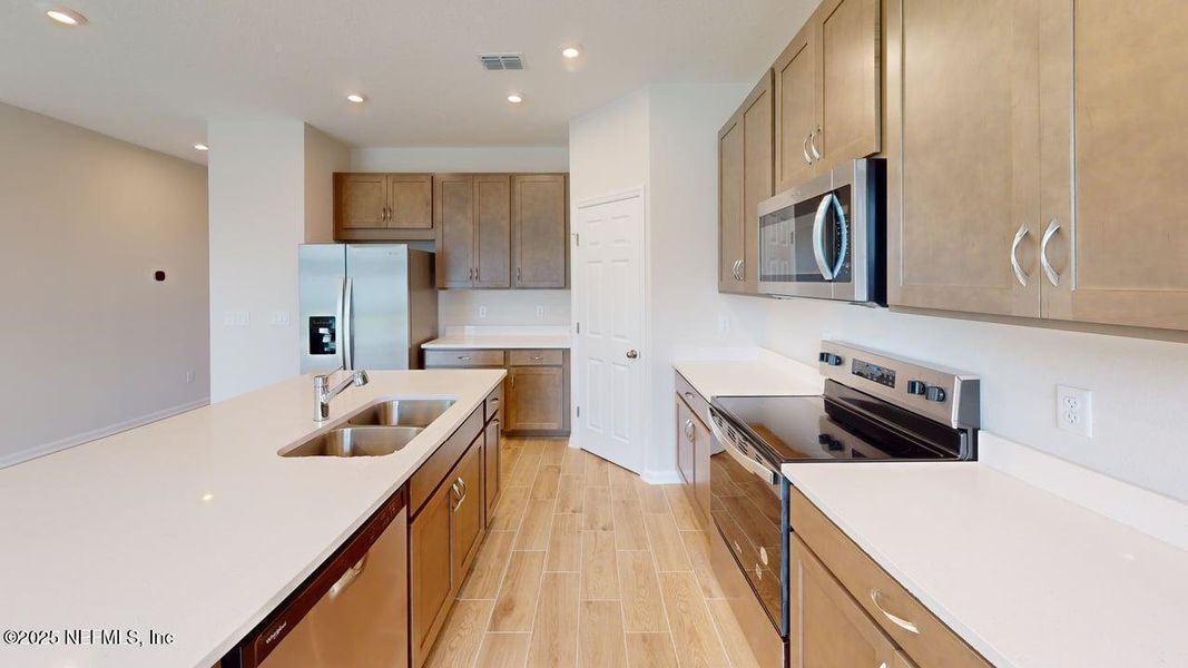 Furnished interior view inside a new home in Sandridge Hills, Green Cove Springs (Image 3).