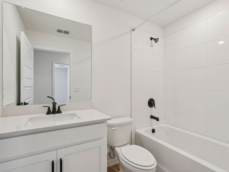 Furnished interior view inside a new home in Oakfield Trails - Signature Series, Parrish (Image 8). Furnished interior view inside a new home in Oakfield Trails - Signature Series, Parrish (Image 8).