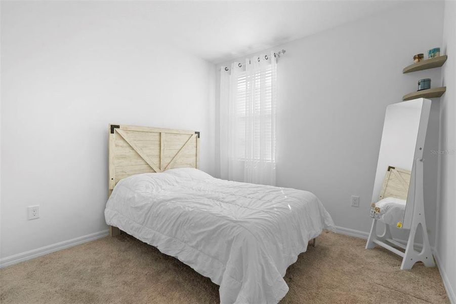 Furnished interior view inside a new home in Deer Run at Crosswinds, Davenport (Image 8).