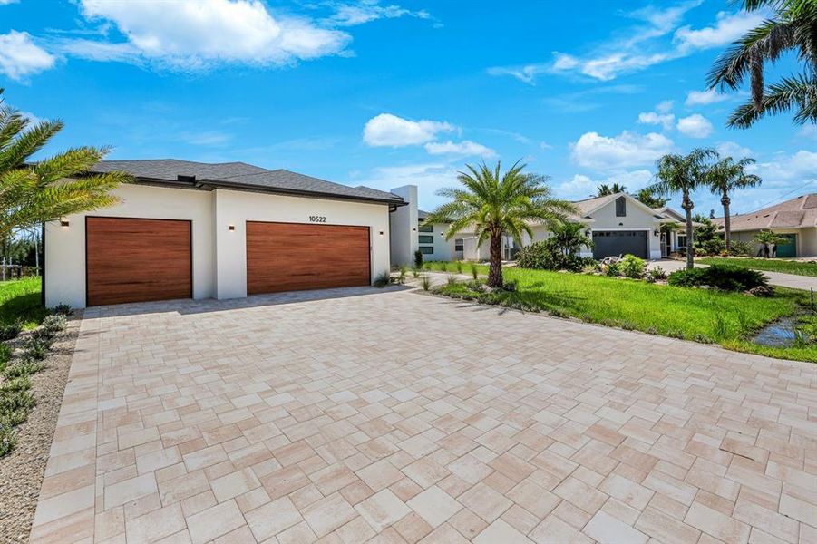 Front exterior of a new home in , Port Charlotte, FL, highlighting curb appeal (Image 19).