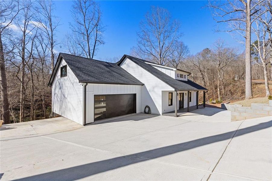 Front exterior of a new home in , Gainesville, GA, highlighting curb appeal (Image 25).