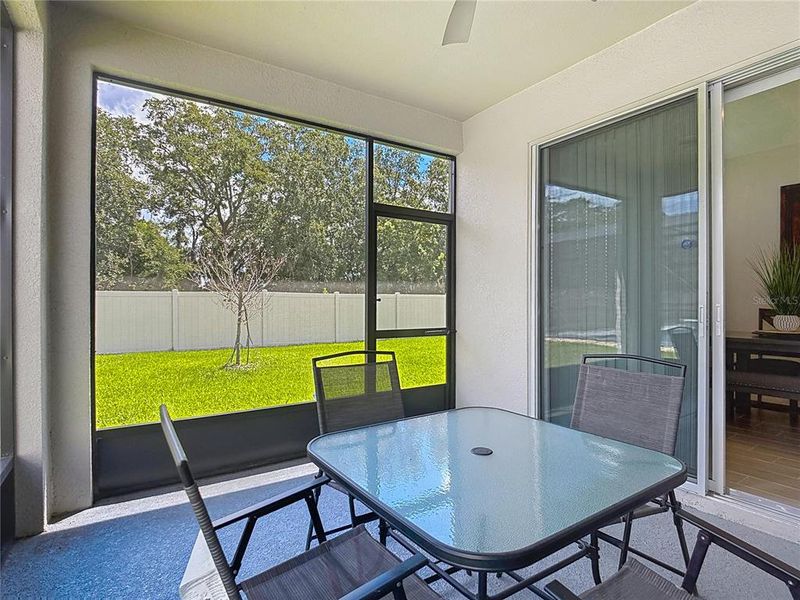 Exterior details and patio area of a home in Seasons at Big Sky, Kissimmee (Image 28).