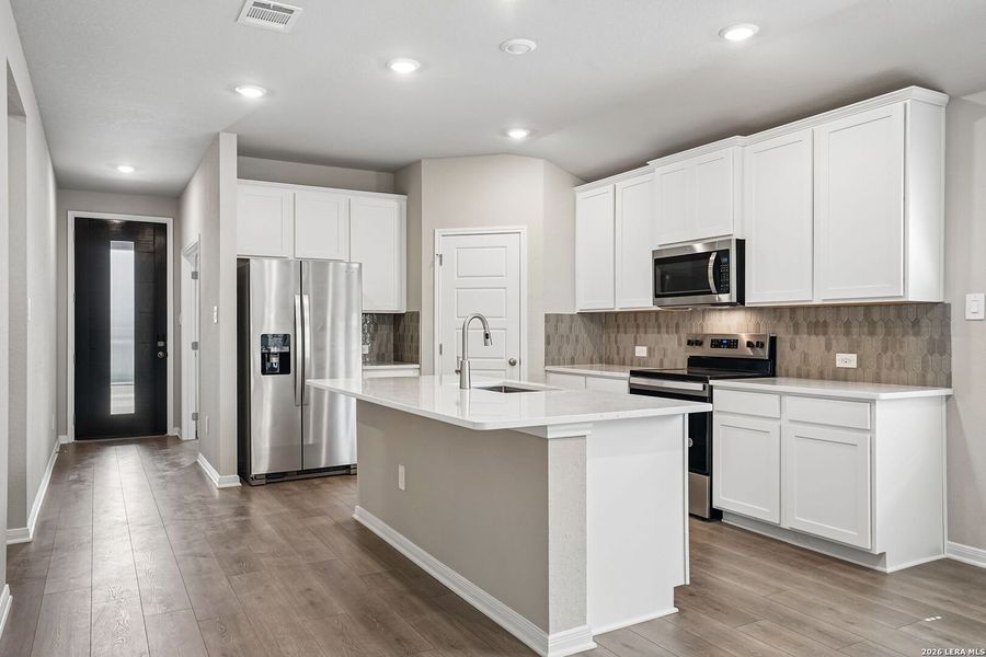Furnished interior view inside a new home in Legendary Trails - Premier Series, Cibolo (Image 7).
