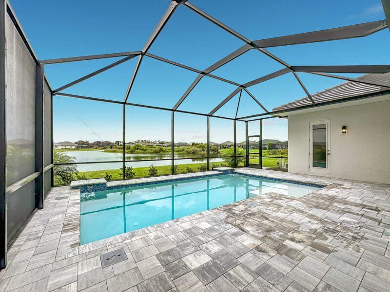 Exterior details and patio area of a home in River Preserve Estates, Parrish (Image 28).