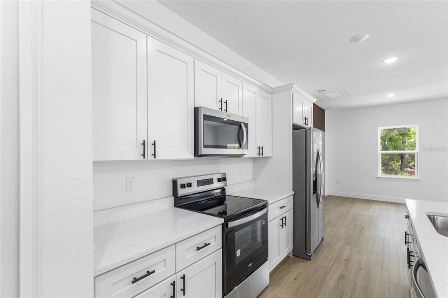 Furnished interior view inside a new home in , Dunnellon (Image 6).
