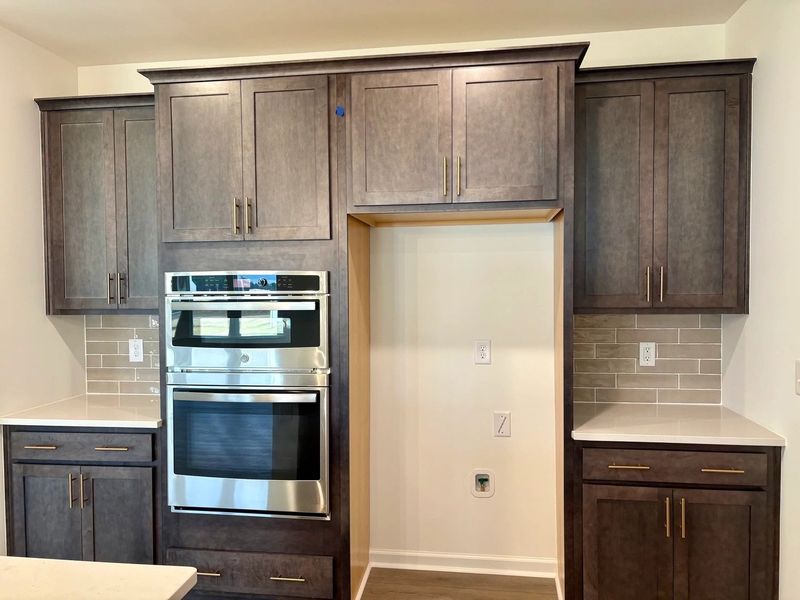 Kitchen featuring AW Collection® Oxford - Matte finishes, light wood, and refined style. Kitchen featuring AW Collection® Oxford - Matte finishes, light wood, and refined style.