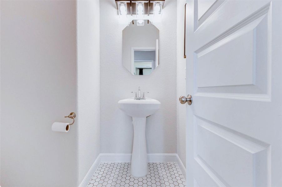 A convenient half bath on the main level. A convenient half bath on the main level.