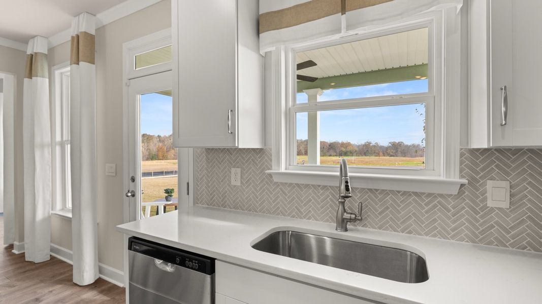Representative furnished interior of a home built from the Savannah by D.R. Horton in Evergreen Crossing, Locust Grove (Image 8).