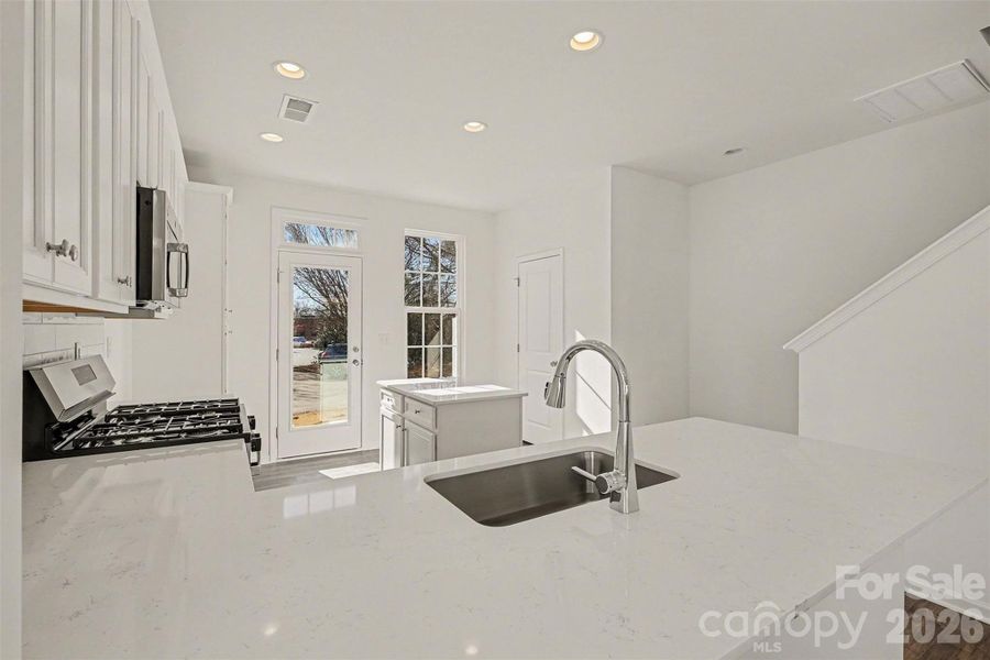 Furnished interior view inside a new home in , Huntersville (Image 6).