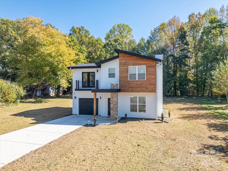 Front exterior of a new home in , Shelby, NC, highlighting curb appeal (Image 24).