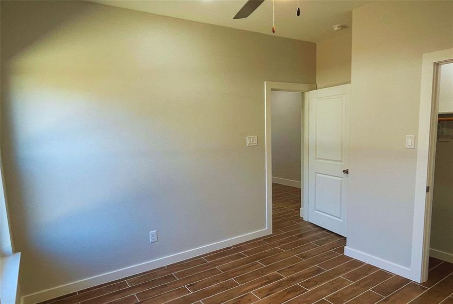 Unfurnished room featuring ceiling fan