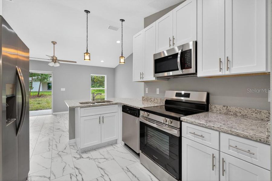 Furnished interior view inside a new home in , Ocklawaha (Image 7).