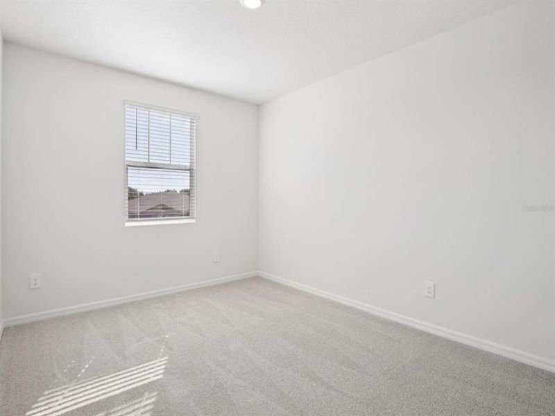 Spacious, unfurnished interior of a new home in Coasterra - Reserve Series, Palmetto (Image 16).
