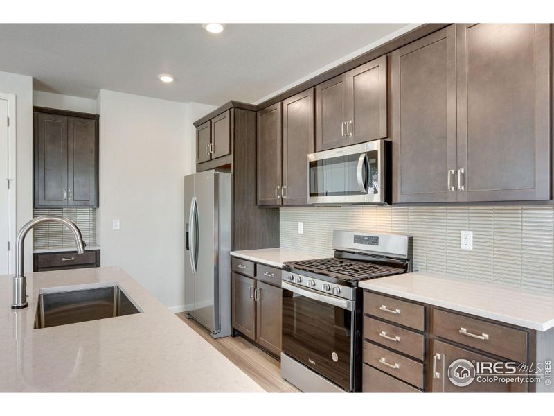 Furnished interior view inside a new home in Westside Crossing Townhomes, Berthoud (Image 13).