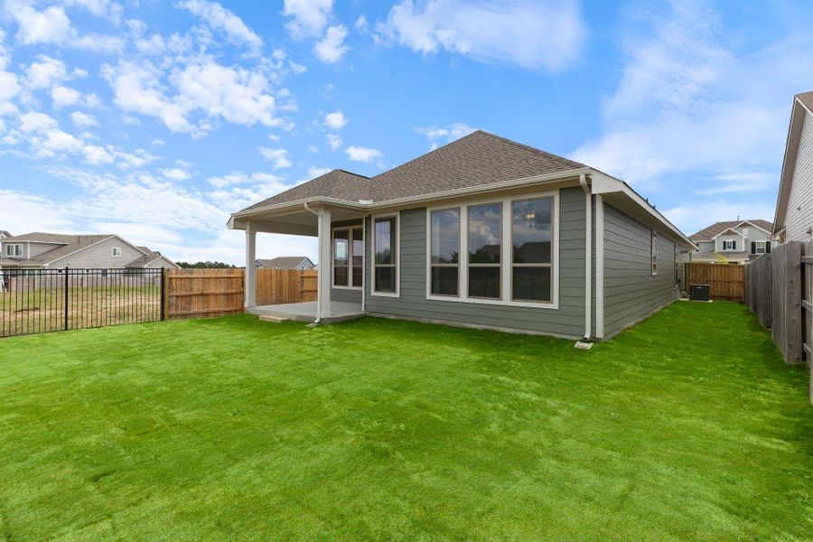 Rear of Home and Private Backyard