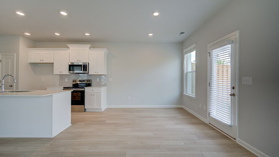 Furnished interior view inside a new home in Bowers Farm Townhomes, McDonough (Image 11).