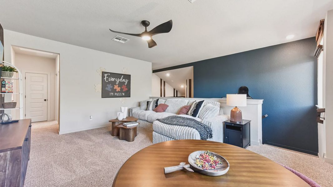 Representative furnished interior of a home built from the Peyton by Chesmar Homes in The Grove at Blackhawk, Pflugerville (Image 39).