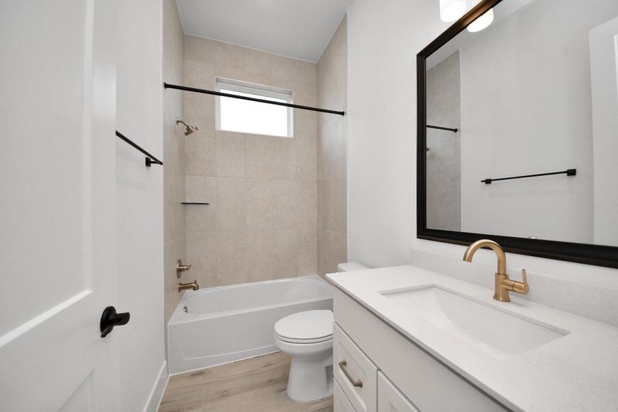 Furnished interior view inside a new home in Meridiana Courtyard Collection, Manvel (Image 17).