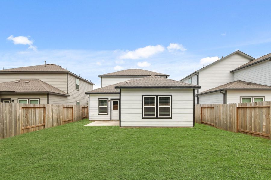 Exterior details and patio area of a home in Lonestar Collection at Granger Pines, Conroe (Image 4). Exterior details and patio area of a home in Lonestar Collection at Granger Pines, Conroe (Image 4).