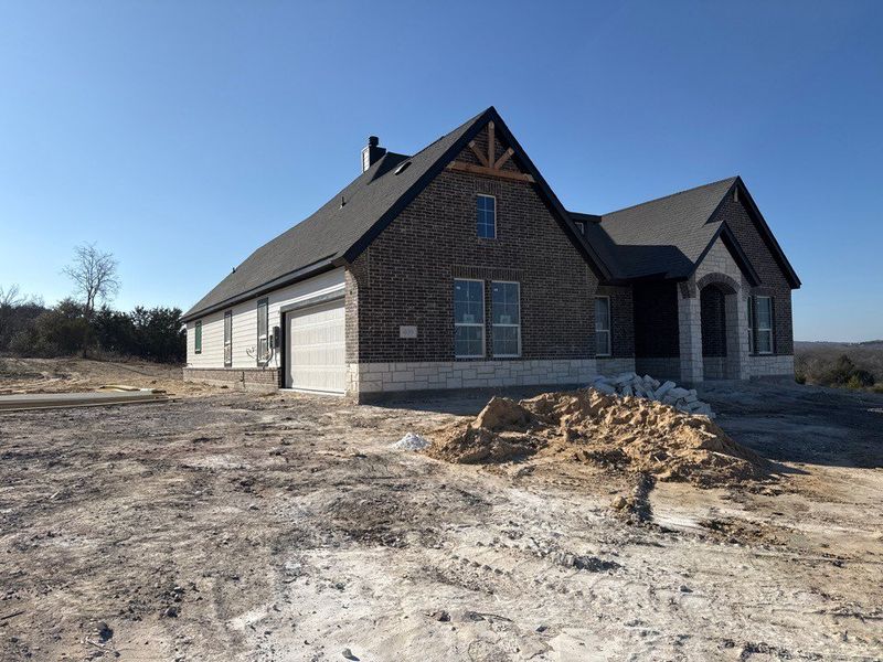 In-progress construction of a new home in Oak Grove Addition, Springtown, TX (Image 4).