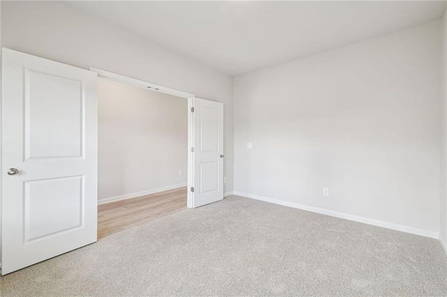 Spacious, unfurnished interior of a new home in Creekside at Oxford Park, Fairburn (Image 63).