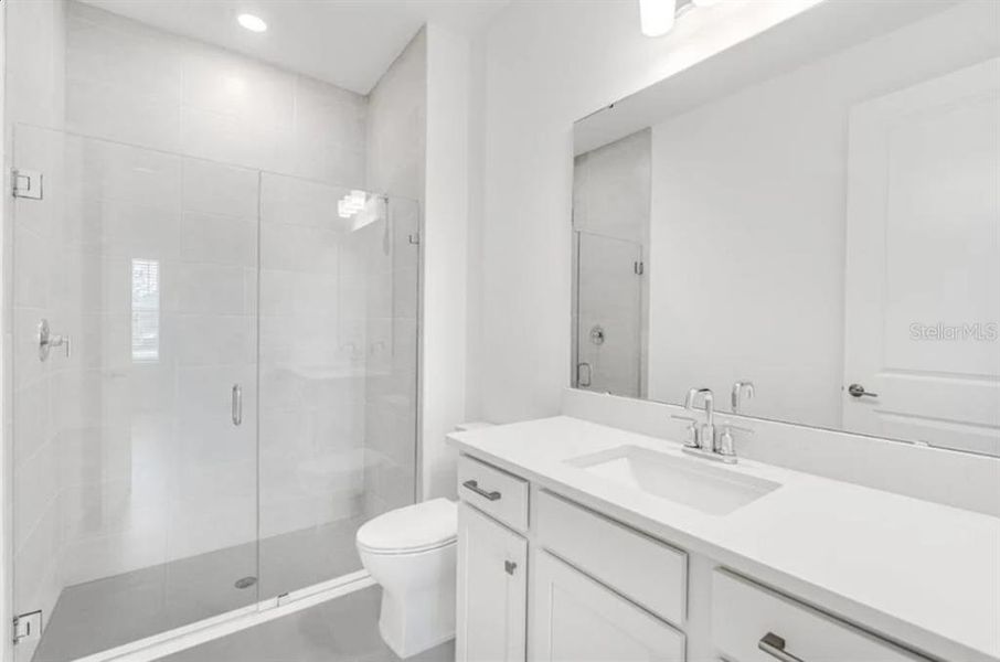 Furnished interior view inside a new home in Harvest at Ovation, Winter Garden (Image 14).