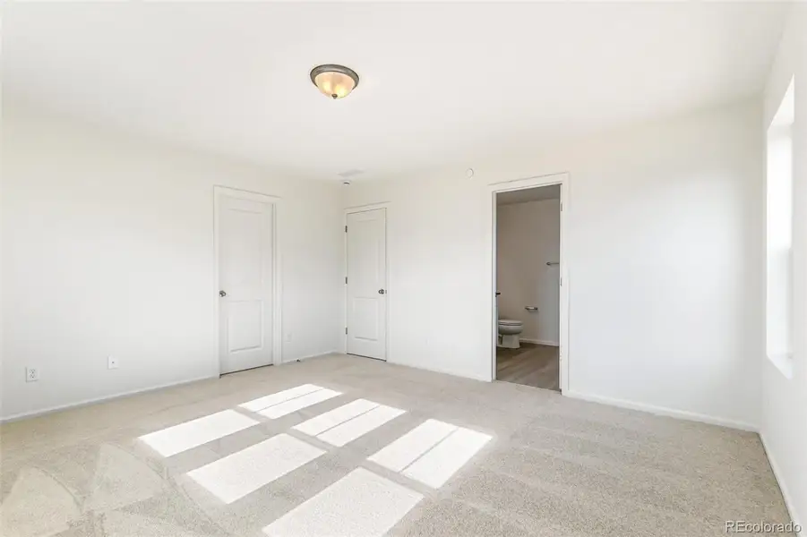Spacious, unfurnished interior of a new home in Turnberry, Commerce City (Image 23).