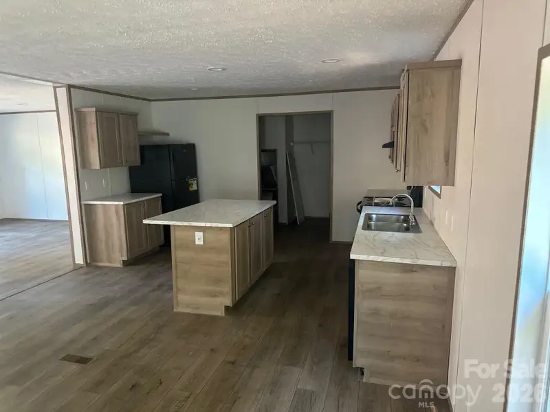 Furnished interior view inside a new home in , Mooresville (Image 3).