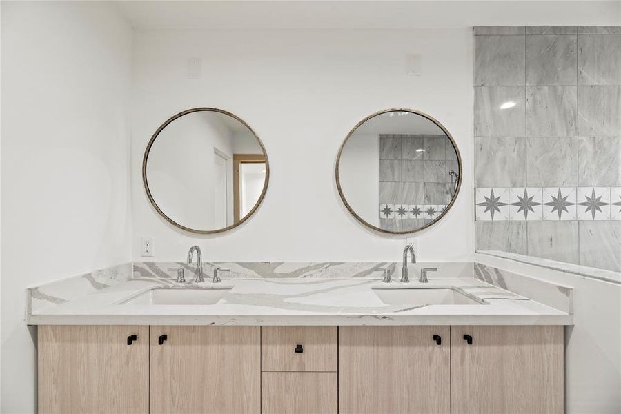 Lots of room for you to get ready for the day.  Double sinks and large quartz counters give everyone their own space.