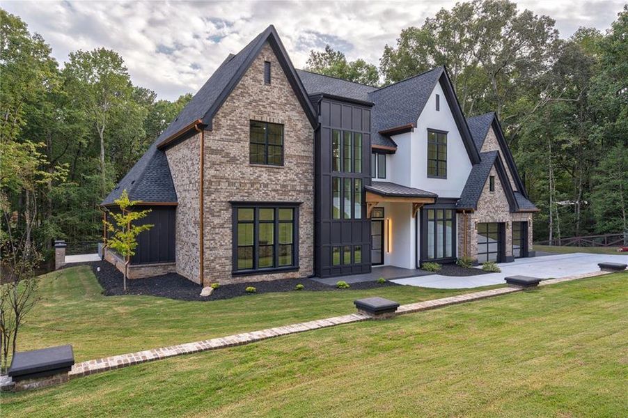 Front exterior of a new home in , Loganville, GA, highlighting curb appeal (Image 34). Front exterior of a new home in , Loganville, GA, highlighting curb appeal (Image 34).