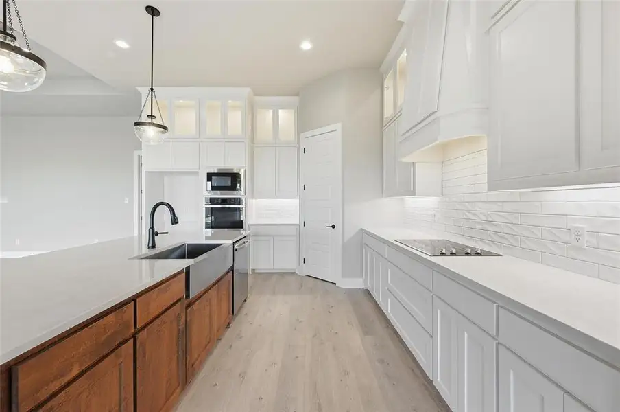 Furnished interior view inside a new home in Coyote Crossing, Godley (Image 9).
