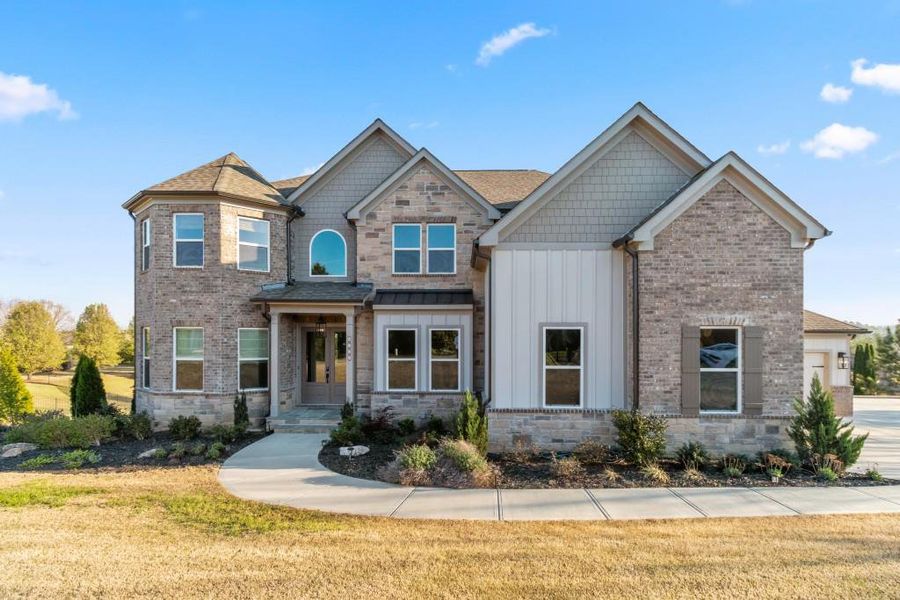Front exterior of a new home in , Flowery Branch, GA, highlighting curb appeal (Image 27).