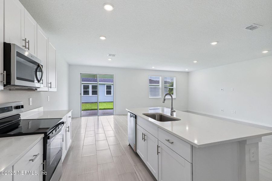 Furnished interior view inside a new home in Flagler Village - Signature Series, Palm Coast (Image 6).