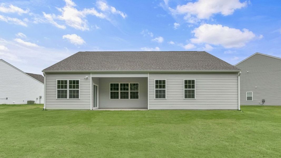 Exterior details and patio area of a home in Cross Creek, Spring Lake (Image 15).