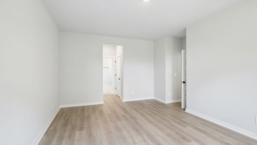 Representative unfurnished interior of a home built from the Ansley by D.R. Horton in Harvest Point, Spring Hill (Image 61).