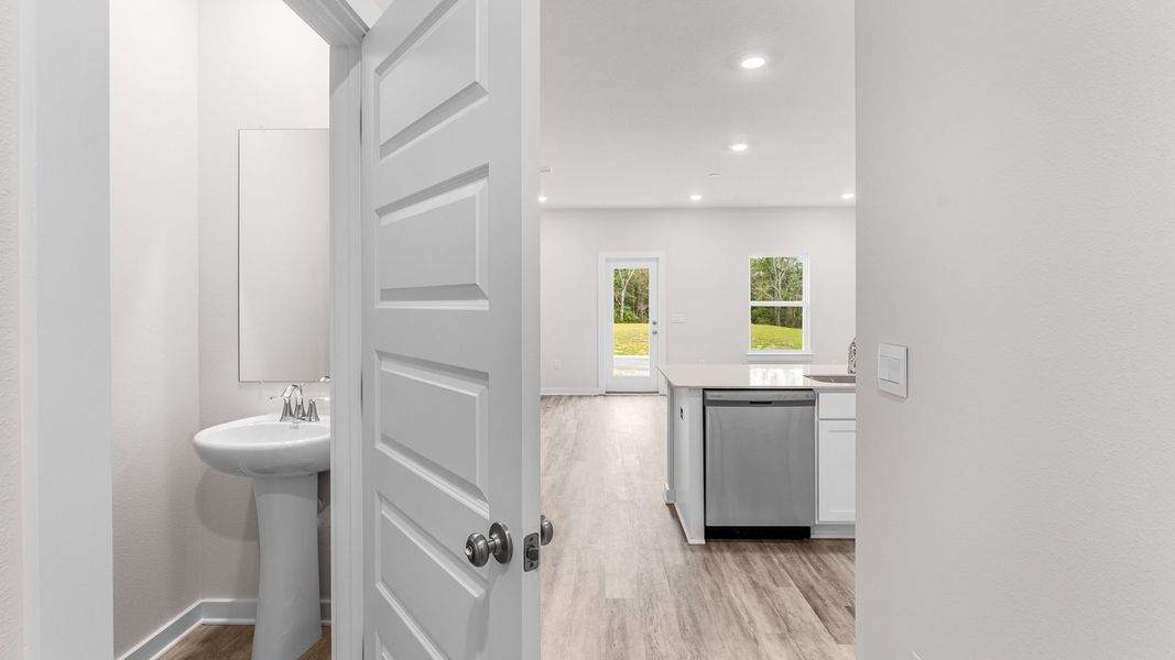 Furnished interior view inside a new home in Genoa Landing Townhomes, Freeport (Image 10).