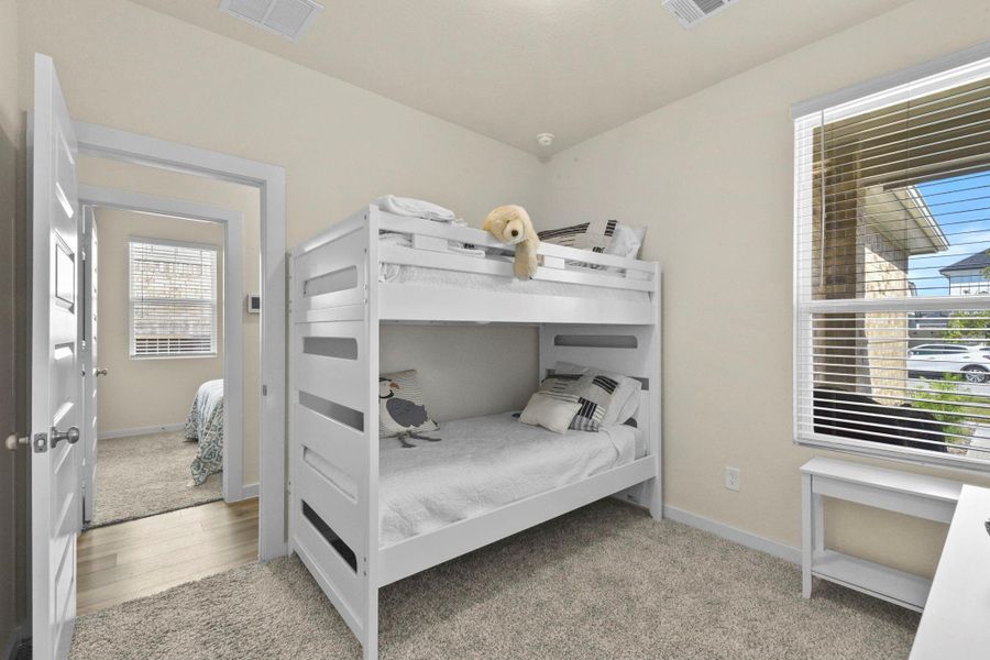 Furnished interior view inside a new home in Harper's Preserve - Traditional Series, Conroe (Image 26).