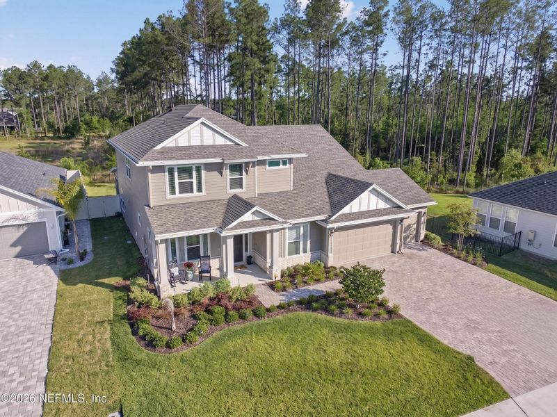 Front exterior of a new home in , St. Johns, FL, highlighting curb appeal (Image 26).