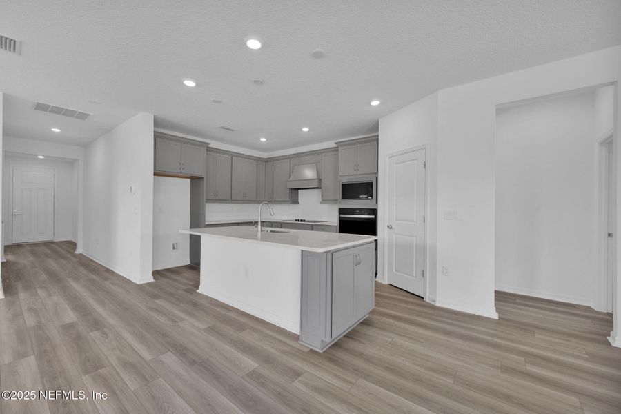 Furnished interior view inside a new home in Hyland Trail, Green Cove Springs (Image 12).
