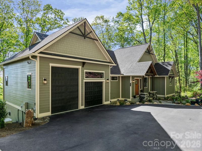 Front exterior of a new home in , Hendersonville, NC, highlighting curb appeal (Image 20).