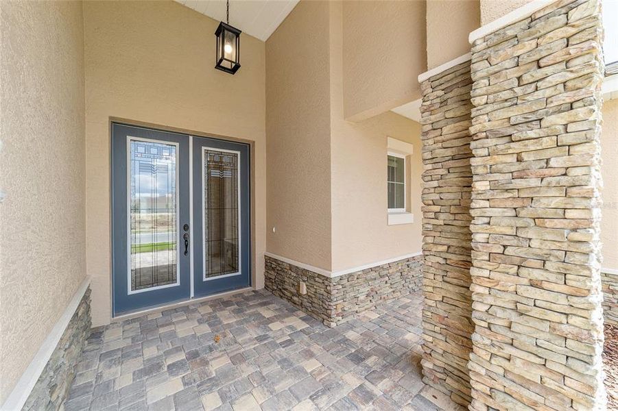 Exterior details and patio area of a home in On Top of the World Communities, Ocala (Image 26).