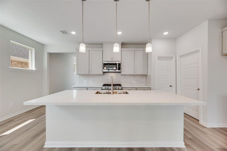 Furnished interior view inside a new home in Spiritas Ranch, Little Elm (Image 6). Furnished interior view inside a new home in Spiritas Ranch, Little Elm (Image 6).